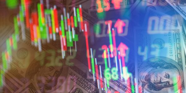 Double exposure of stock market in tablet with money and chart.